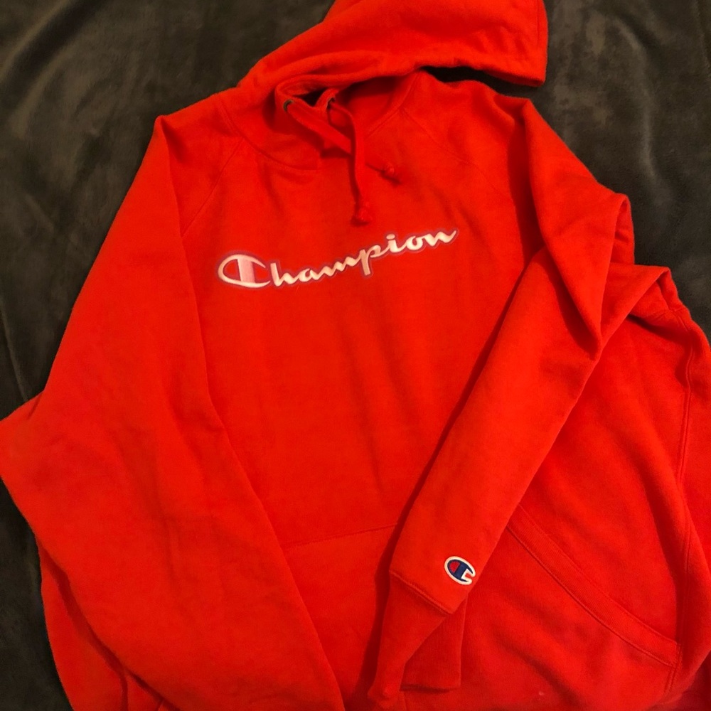 a red champion hoodie